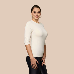 3/4 Sleeve Crew Neck Luxury Layering Top or Shell in Off-White made sustainably in the USA by Adea Clothing with silky soft Italian fabric side view.
