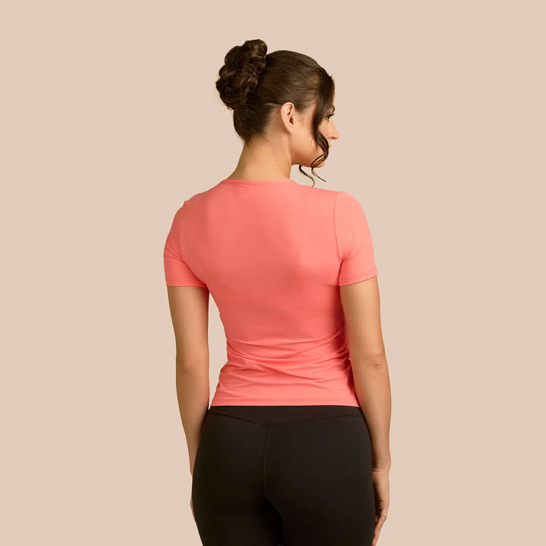 Short Sleeve Crew Neck Luxury Layering Top or Shell in Apricot made sustainably in the USA by Adea Clothing with silky soft Italian fabric back view.