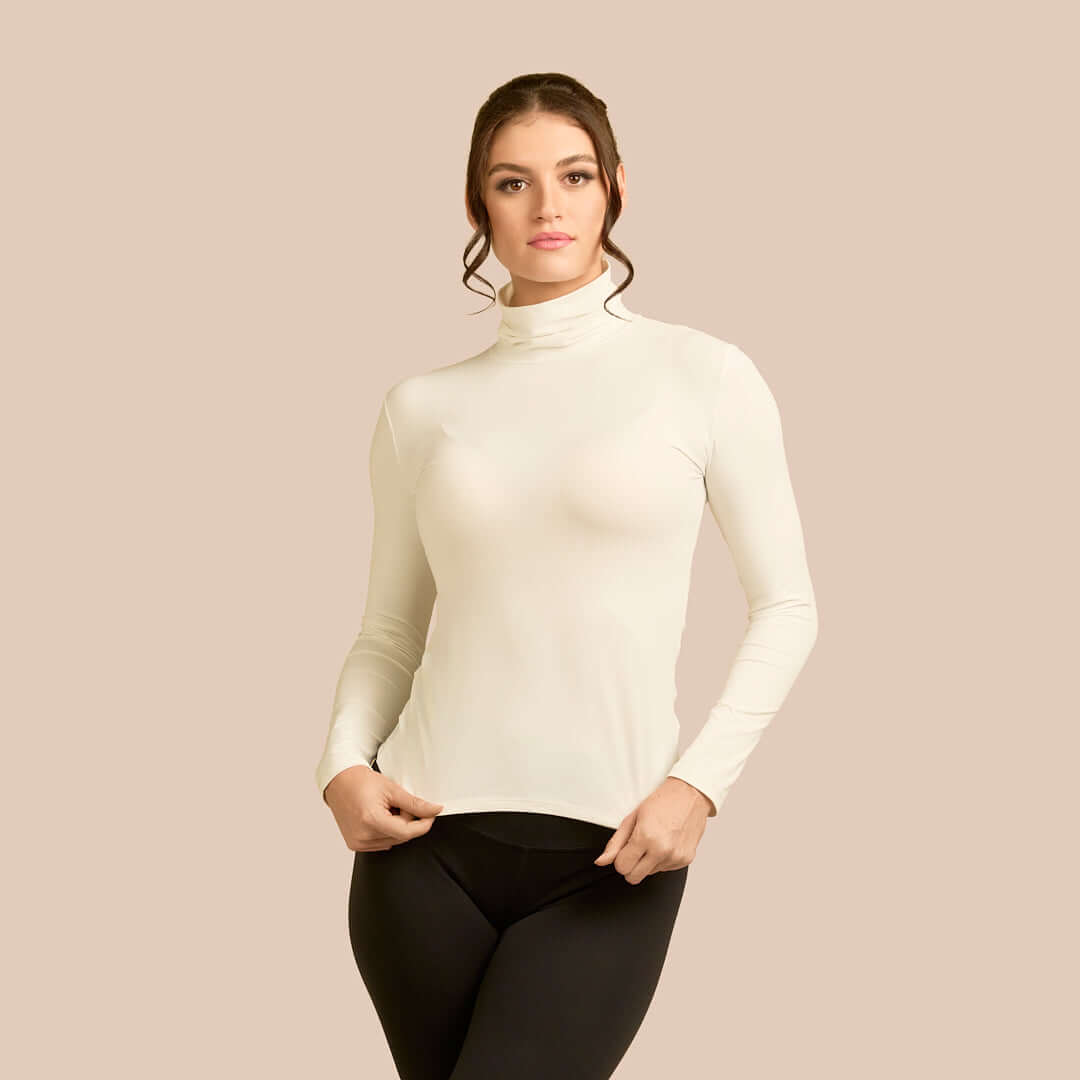 Long Sleeve Turtleneck Luxury Layering Top or Shell in Off-White made sustainably in the USA by Adea Clothing with silky soft Italian fabric front view.