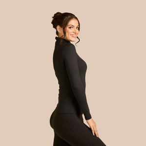 Long Sleeve Turtleneck Luxury Layering Top or Shell in Black made sustainably in the USA by Adea Clothing with silky soft Italian fabric side view.