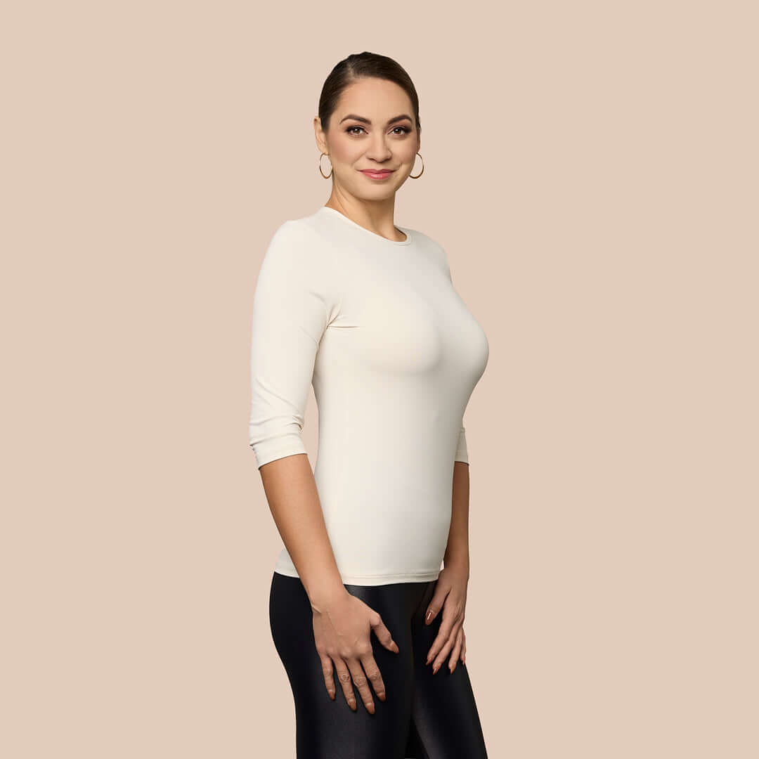 3/4 Sleeve Crew Neck Luxury Layering Top or Shell in Off-White made sustainably in the USA by Adea Clothing with silky soft Italian fabric V-neck side view.