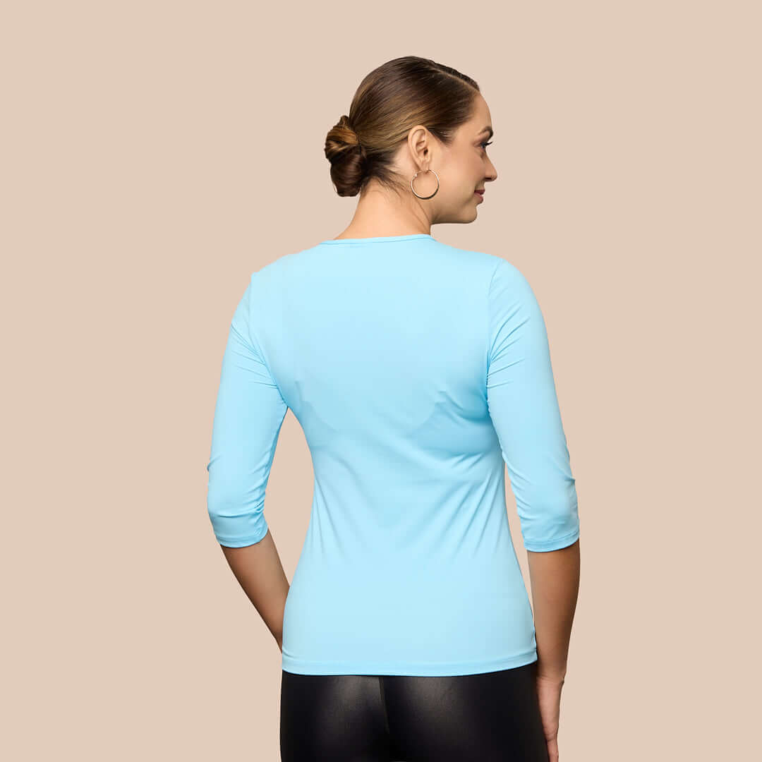 3/4 Sleeve Crew Neck Luxury Layering Top or Shell in Sky Blue made sustainably in the USA by Adea Clothing with silky soft Italian fabric V-neck back view.