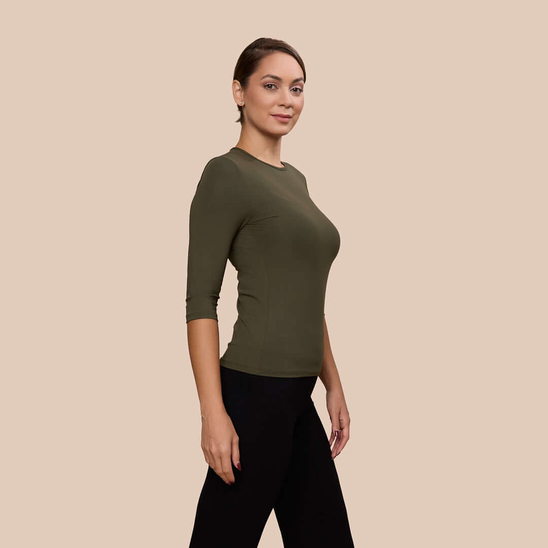 3/4 Sleeve Crew Neck Luxury Layering Top or Shell in Olive made sustainably in the USA by Adea Clothing with silky soft Italian fabric V-neck side view.