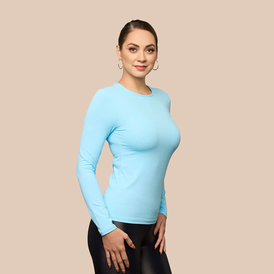 Long Sleeve Crew Neck Luxury Layering Top or Shell in Sky Blue made sustainably in the USA by Adea Clothing with silky soft Italian fabric side view.