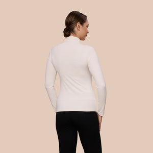 Mock Neck Long Sleeve Luxury Layering Top or Shell in Off-White made sustainably in the USA by Adea Clothing with silky soft Italian fabric back view.