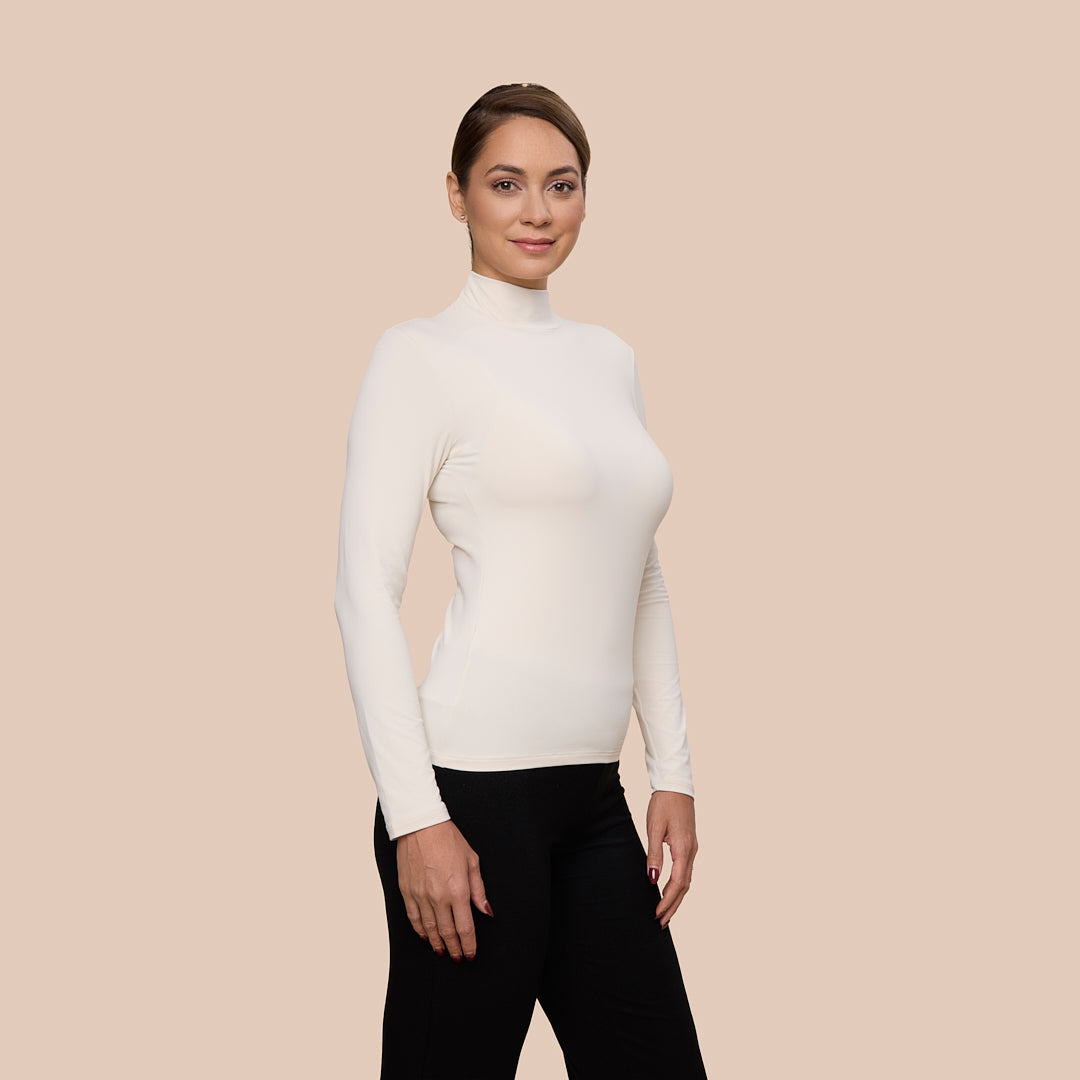 Mock Neck Long Sleeve Luxury Layering Top or Shell in Off-White made sustainably in the USA by Adea Clothing with silky soft Italian fabric side view.