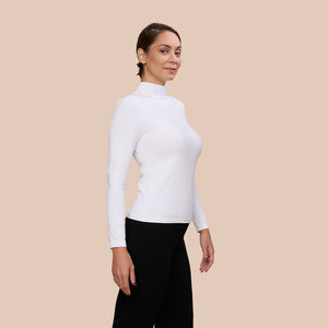 Mock Neck Long Sleeve Luxury Layering Top or Shell in White made sustainably in the USA by Adea Clothing with silky soft Italian fabric side view.