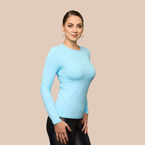 Long Sleeve Crew Neck Luxury Layering Top or Shell in Sky Blue made sustainably in the USA by Adea Clothing with silky soft Italian fabric side view.
