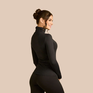 Long Sleeve Turtleneck Luxury Layering Top or Shell in Black made sustainably in the USA by Adea Clothing with silky soft Italian fabric back view.