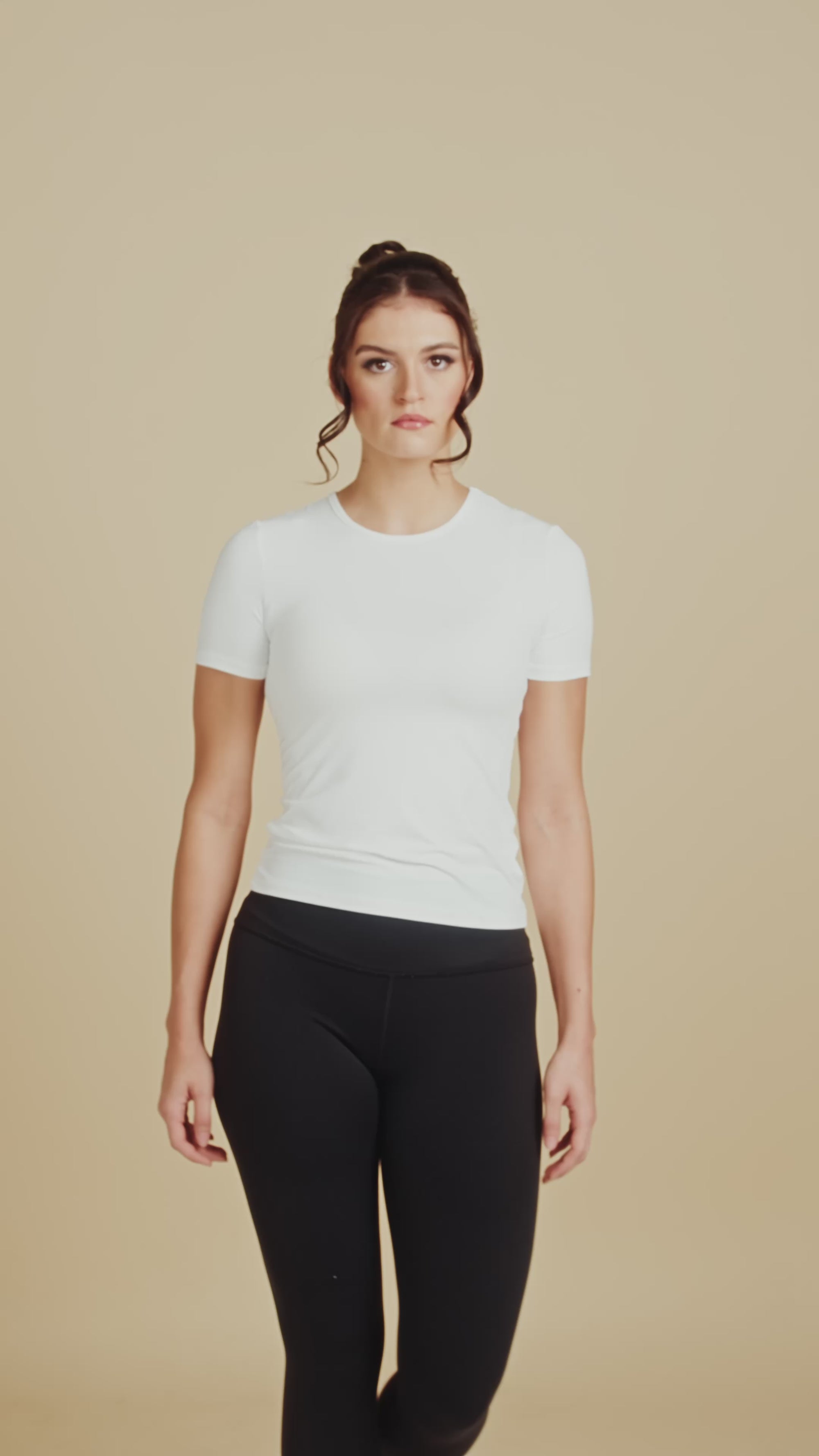 Short Sleeve Crew Neck Luxury Layering Top or Shell in White made sustainably in the USA by Adea Clothing with silky soft Italian fabric runway video.