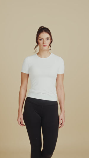 Short Sleeve Crew Neck Luxury Layering Top or Shell in White made sustainably in the USA by Adea Clothing with silky soft Italian fabric runway video.