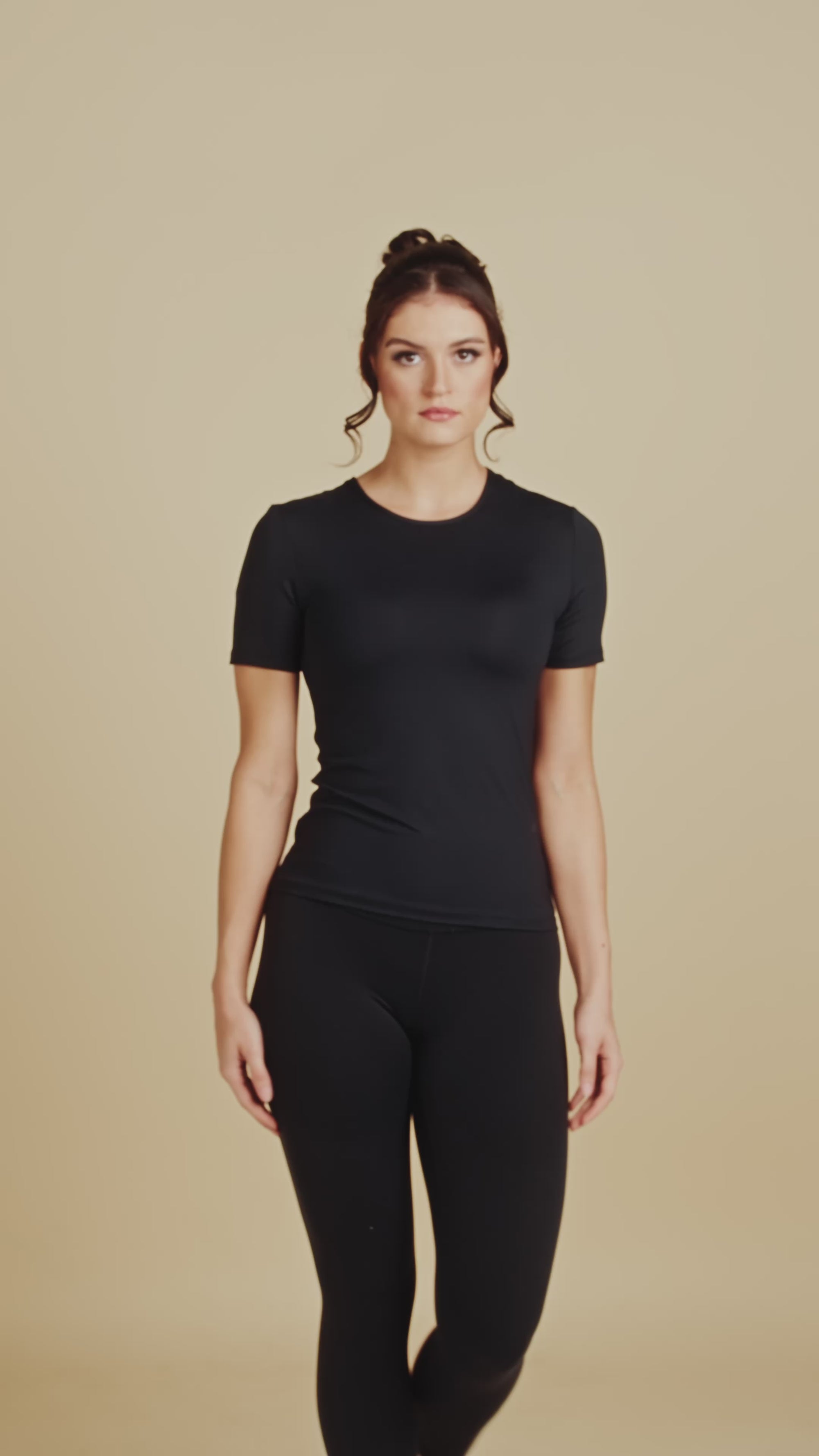Short Sleeve Crew Neck Luxury Layering Top or Shell in Black made sustainably in the USA by Adea Clothing with silky soft Italian fabric runway video.