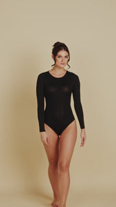 Long Sleeve Crew Neck Luxury Bodysuit in Black made sustainably in the USA by Adea Clothing with silky soft Italian fabric runway video.