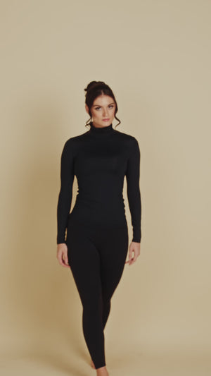 Long Sleeve Turtleneck Luxury Layering Top or Shell in Black made sustainably in the USA by Adea Clothing with silky soft Italian fabric runway video.