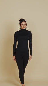 Long Sleeve Turtleneck Luxury Layering Top or Shell in Black made sustainably in the USA by Adea Clothing with silky soft Italian fabric runway video.