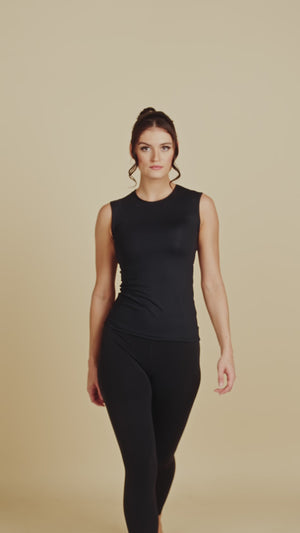 Sleeveless Crew Neck Luxury Layering Top or Shell in Black made sustainably in the USA by Adea Clothing with silky soft Italian fabric runway video.