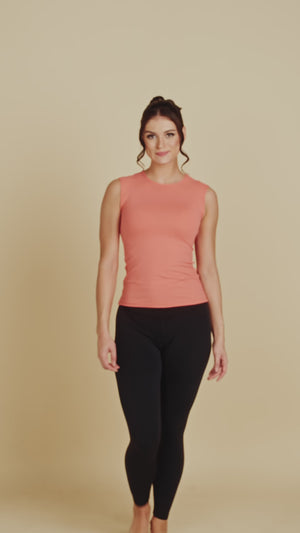 Sleeveless Crew Neck Luxury Layering Top or Shell in Apricot made sustainably in the USA by Adea Clothing with silky soft Italian fabric runway video.