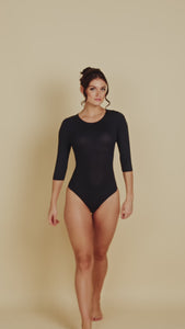 3/4 Sleeve Crew Neck Luxury Bodysuit in Dark Navy  made sustainably in the USA by Adea Clothing with silky soft Italian fabric runway video.