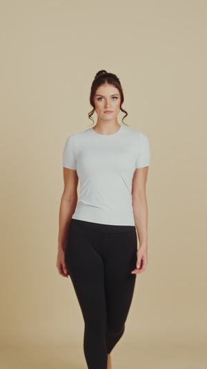 Short Sleeve Crew Neck Luxury Layering Top or Shell in Light Grey made sustainably in the USA by Adea Clothing with silky soft Italian runway video.