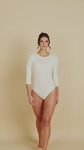 3/4 Sleeve Crew Neck Luxury Bodysuit in Off-White made sustainably in the USA by Adea Clothing with silky soft Italian fabric runway video.